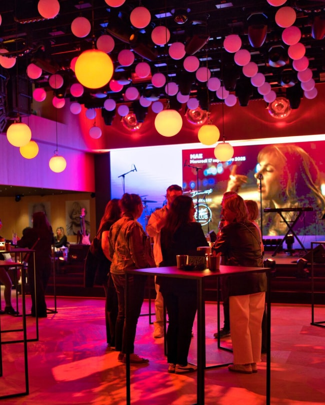 Cocktail evening at the Montreux Jazz Club Millennium under red and yellow spheres