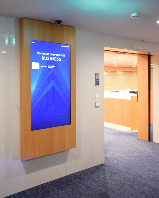 Digital signage at the entrance to the Business Conference Center rooms