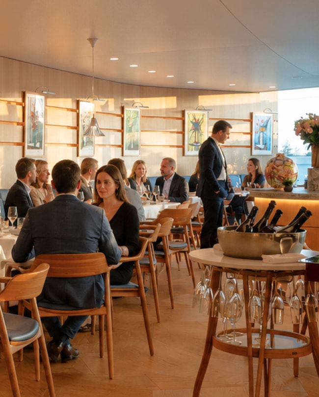 The Millennium Brasserie at lunchtime, busy room with table service
